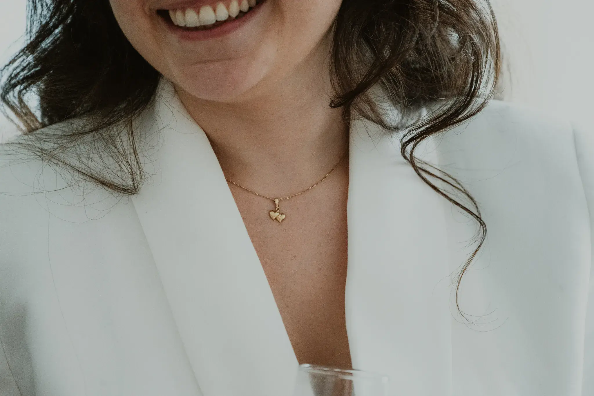 Wedding photography by Bert Van Den Eeckhaut — woman with curls smiling
