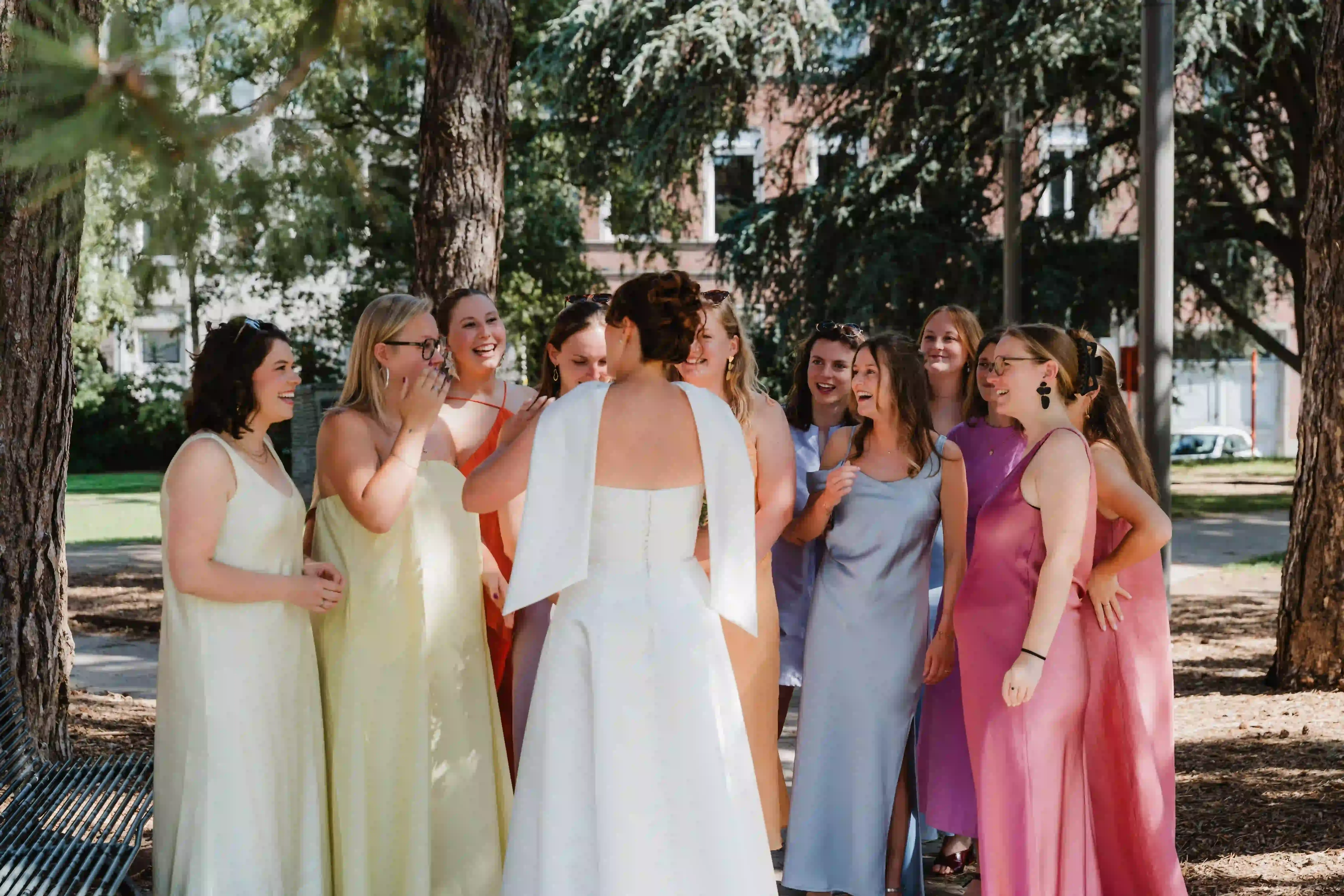 Wedding photography by Bert Van Den Eeckhaut — bride and bridesmaids posing for picture
