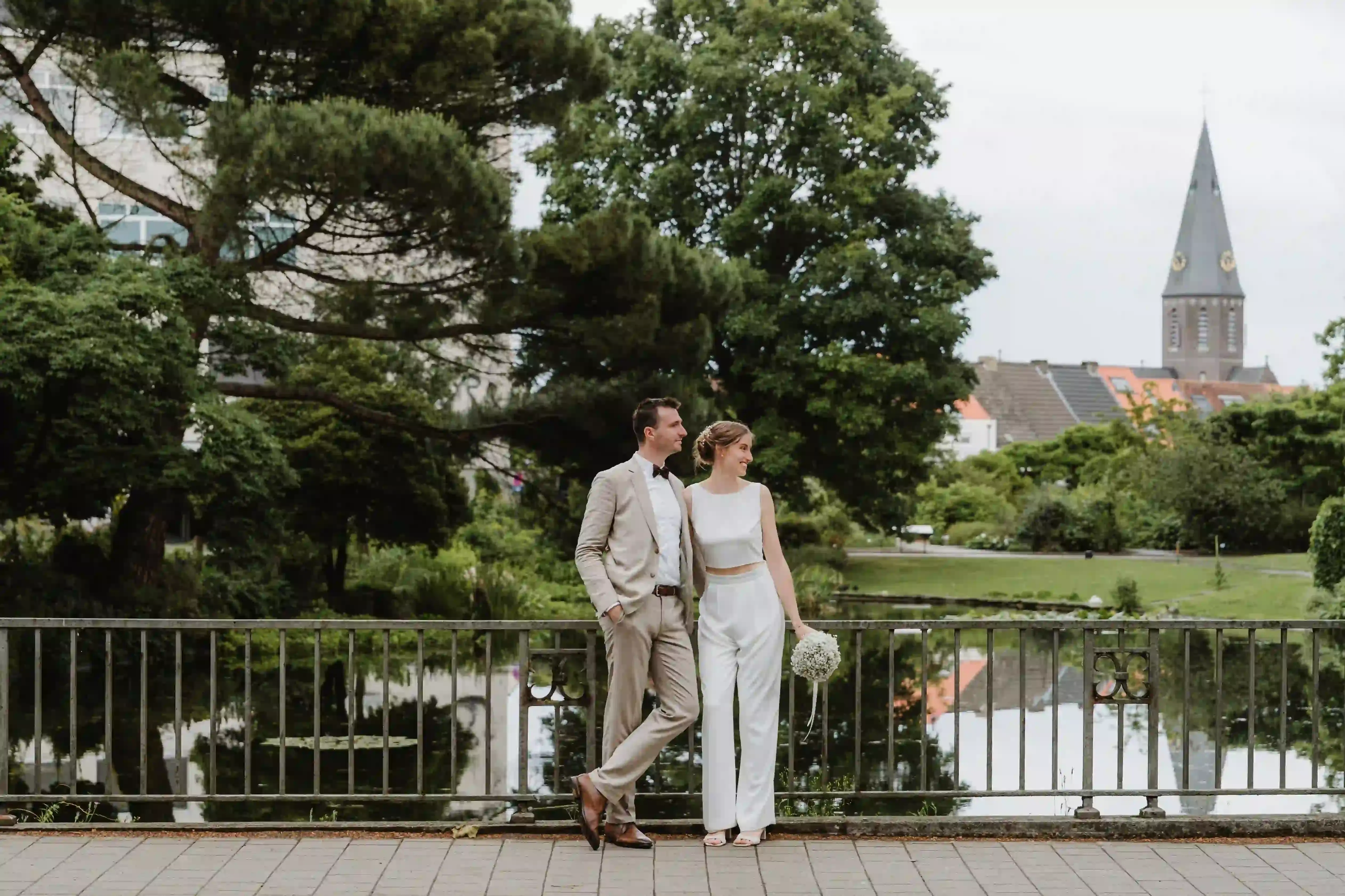 Wedding photography by Bert Van Den Eeckhaut — happy couple posing for photograph