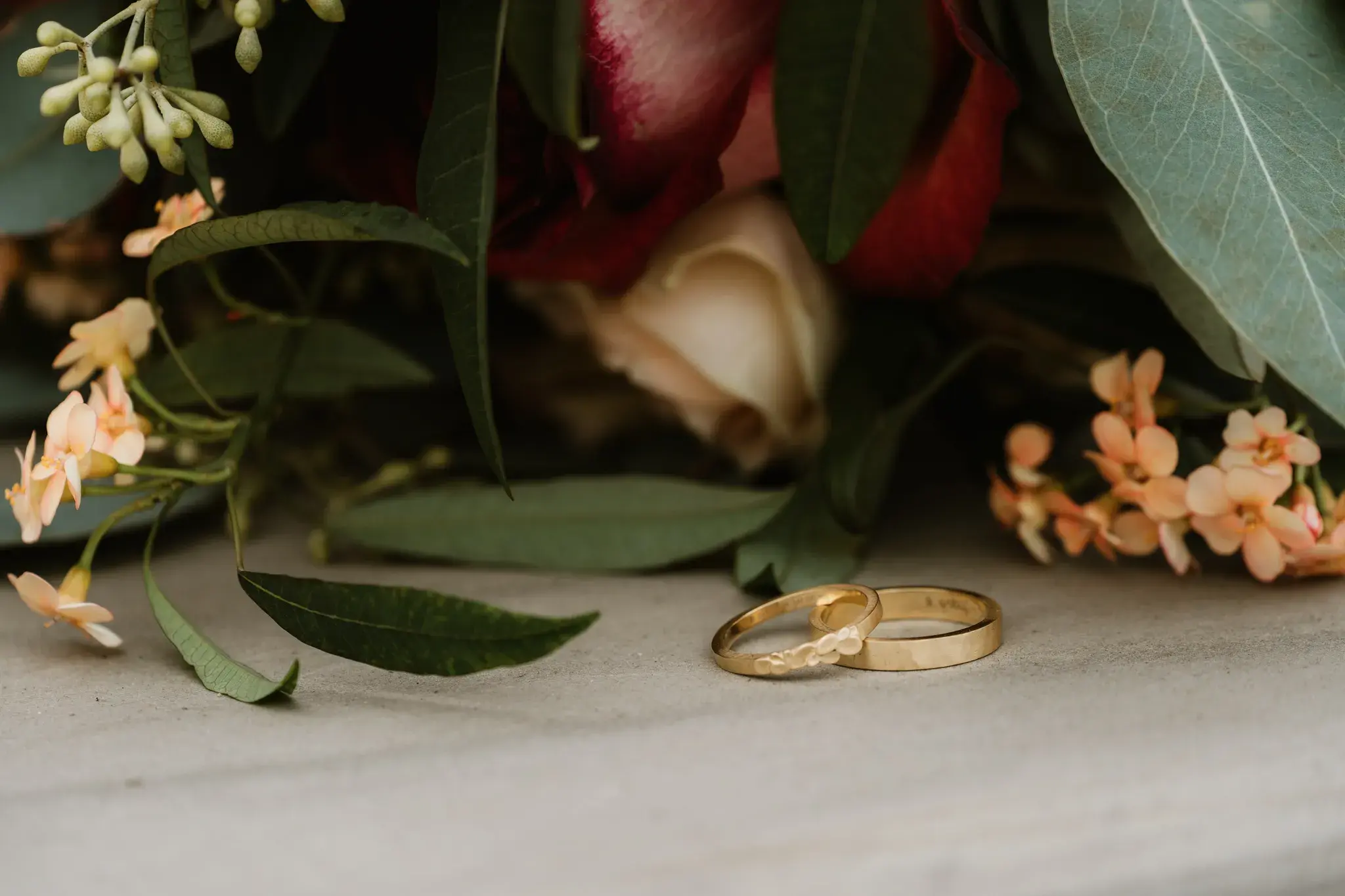Wedding photography by Bert Van Den Eeckhaut — wedding ring on flower arrangement