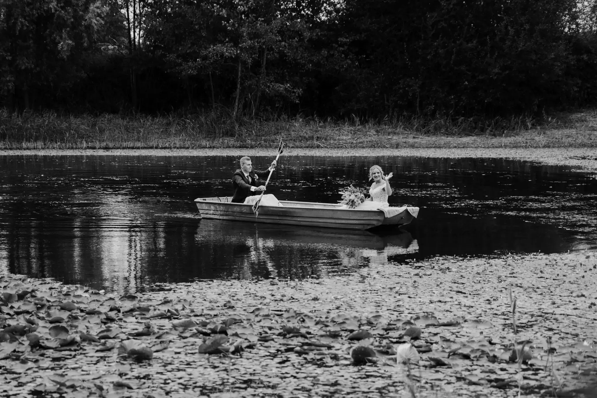 Wedding photography by Bert Van Den Eeckhaut — boat fishing in lake