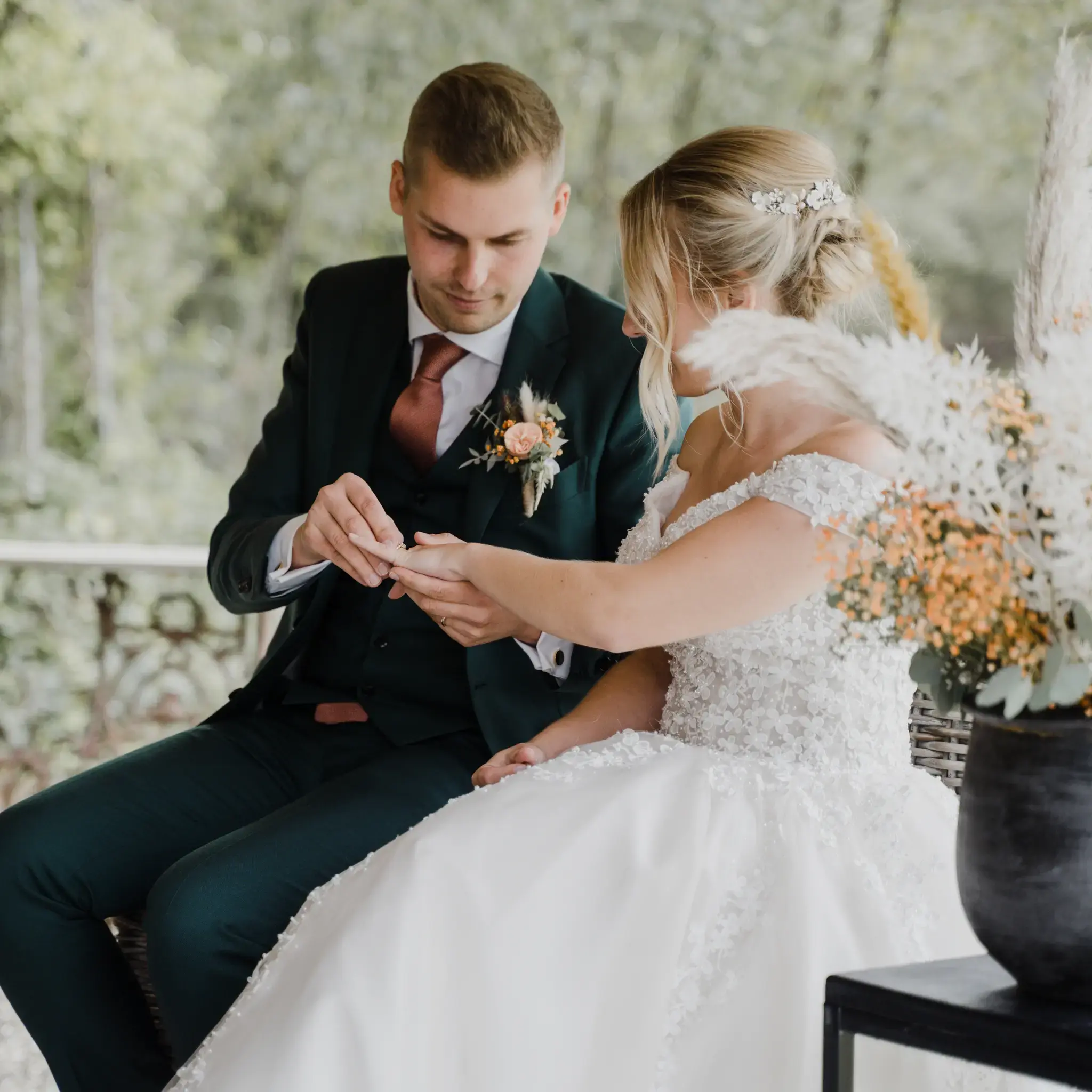 Wedding photography by Bert Van Den Eeckhaut — wedding couple sitting at table