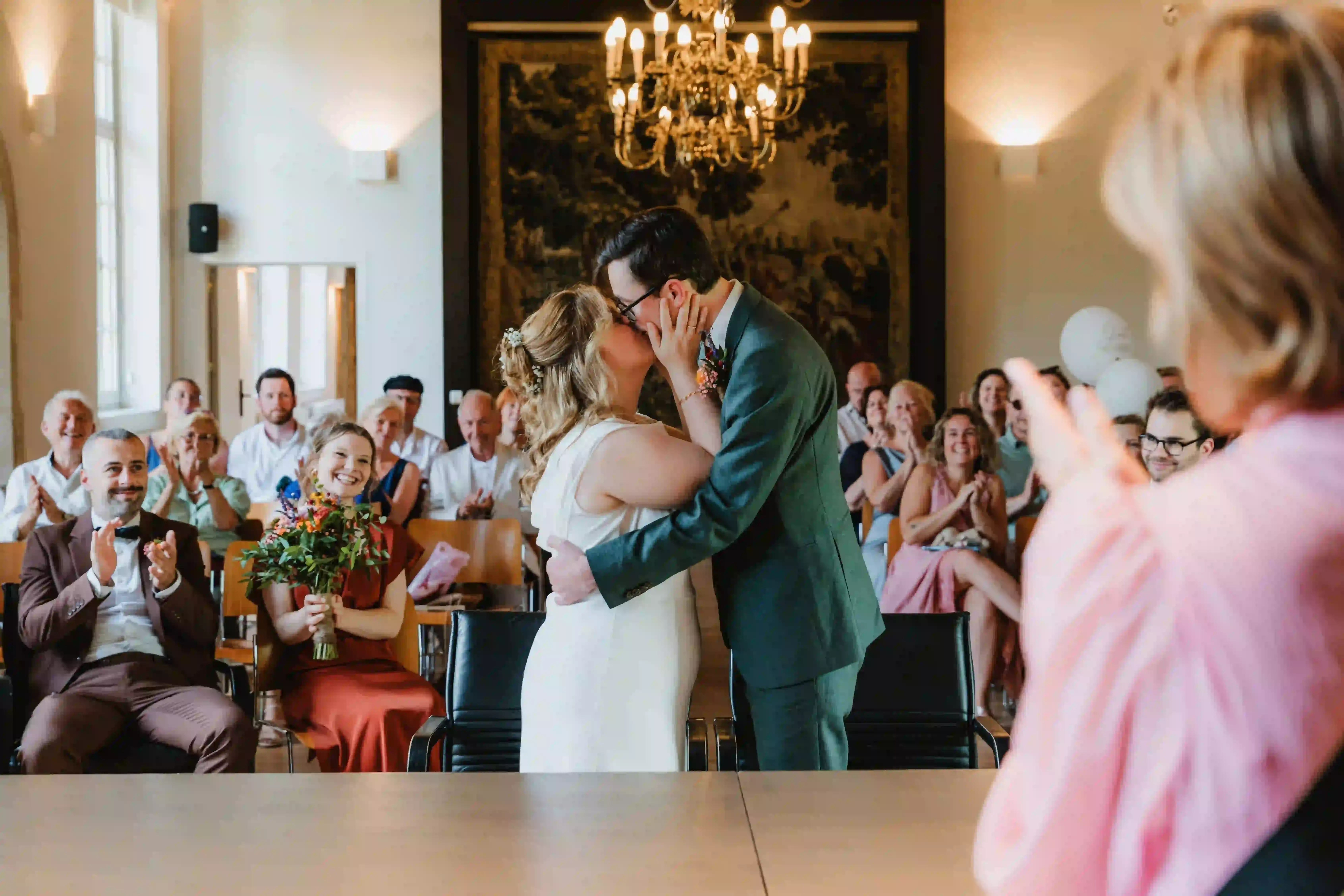 Wedding photography by Bert Van Den Eeckhaut — bride and groom kissing