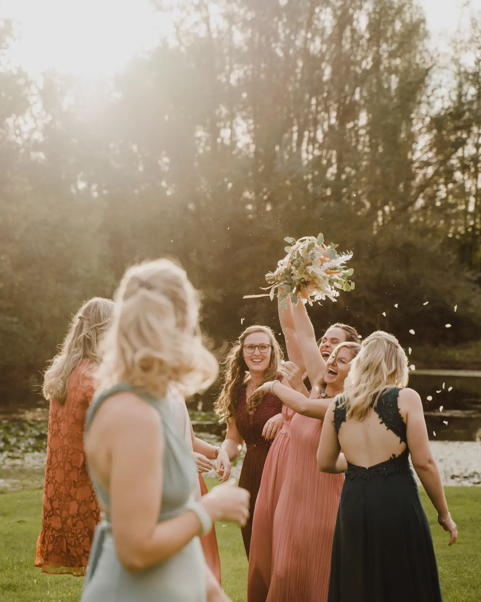 Wedding photography by Bert Van Den Eeckhaut — bride and bridesmaids celebrating