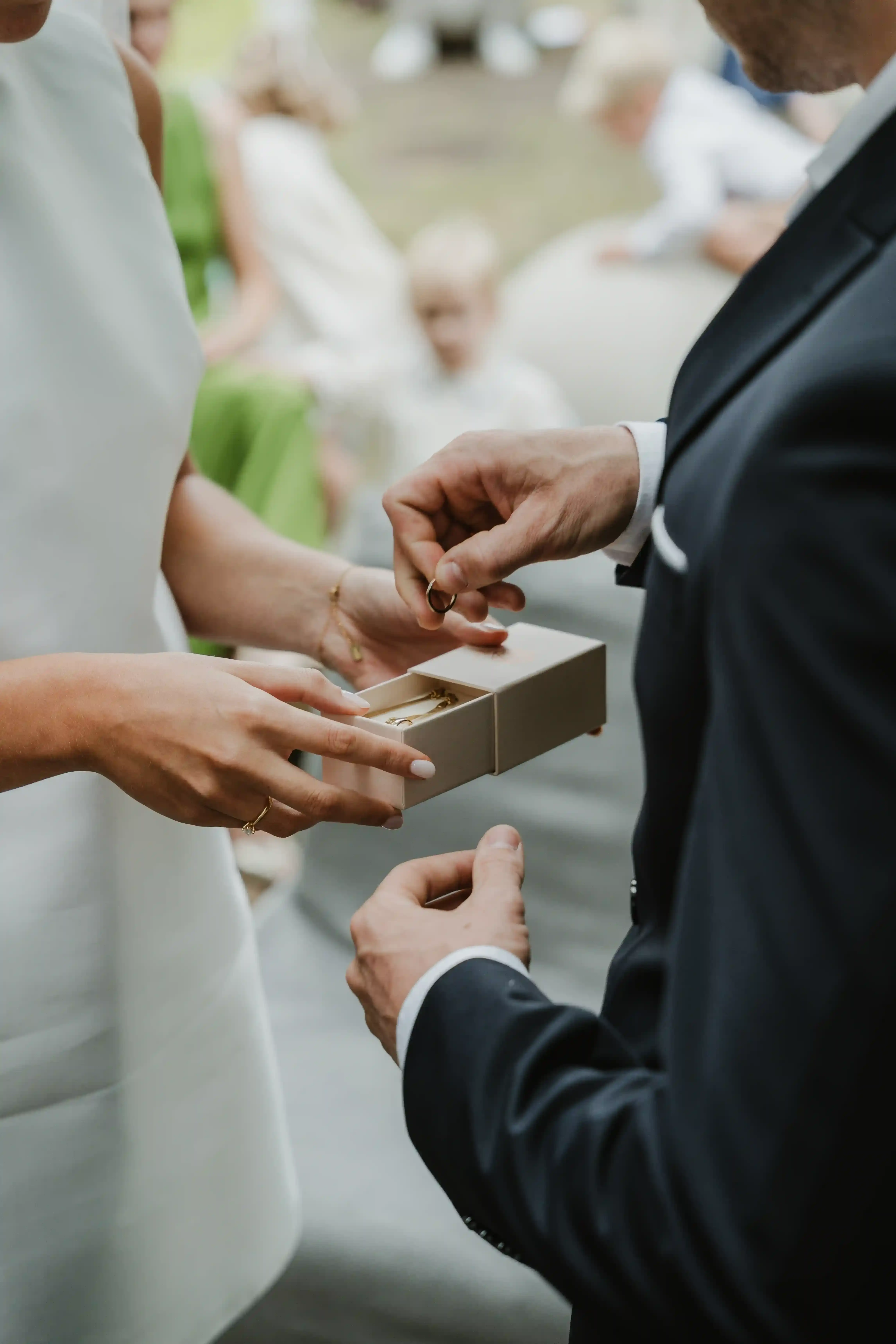 Wedding photography by Bert Van Den Eeckhaut — couple exchanging rings